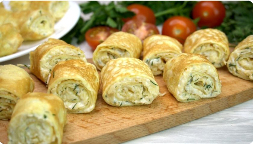 Легкие яичные рулетики с сыром: вкусно и быстро для любого праздника